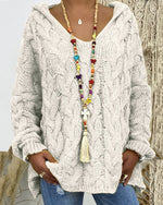 Pull ample à capuche torsadé en maille épaisse