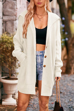 Manteau tricoté mi-long à trois boutons à col revers