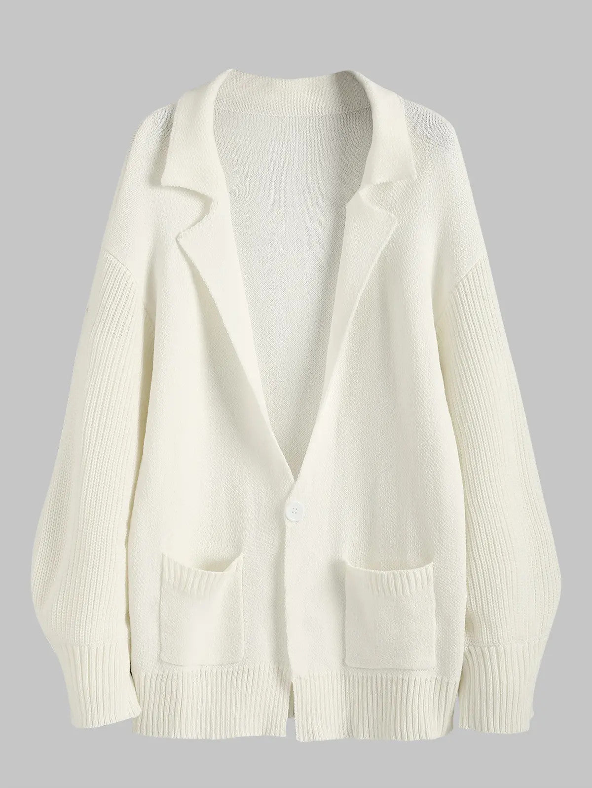 Cardigan long à double poche ouvert sur le devant, manches lanternes, épaules tombantes et revers