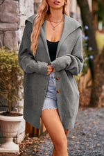 Manteau tricoté mi-long à trois boutons à col revers