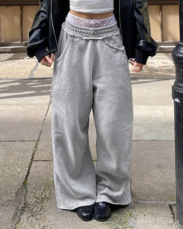 Pantalon de survêtement ample en dentelle grise à la taille