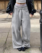 Pantalon de survêtement ample en dentelle grise à la taille