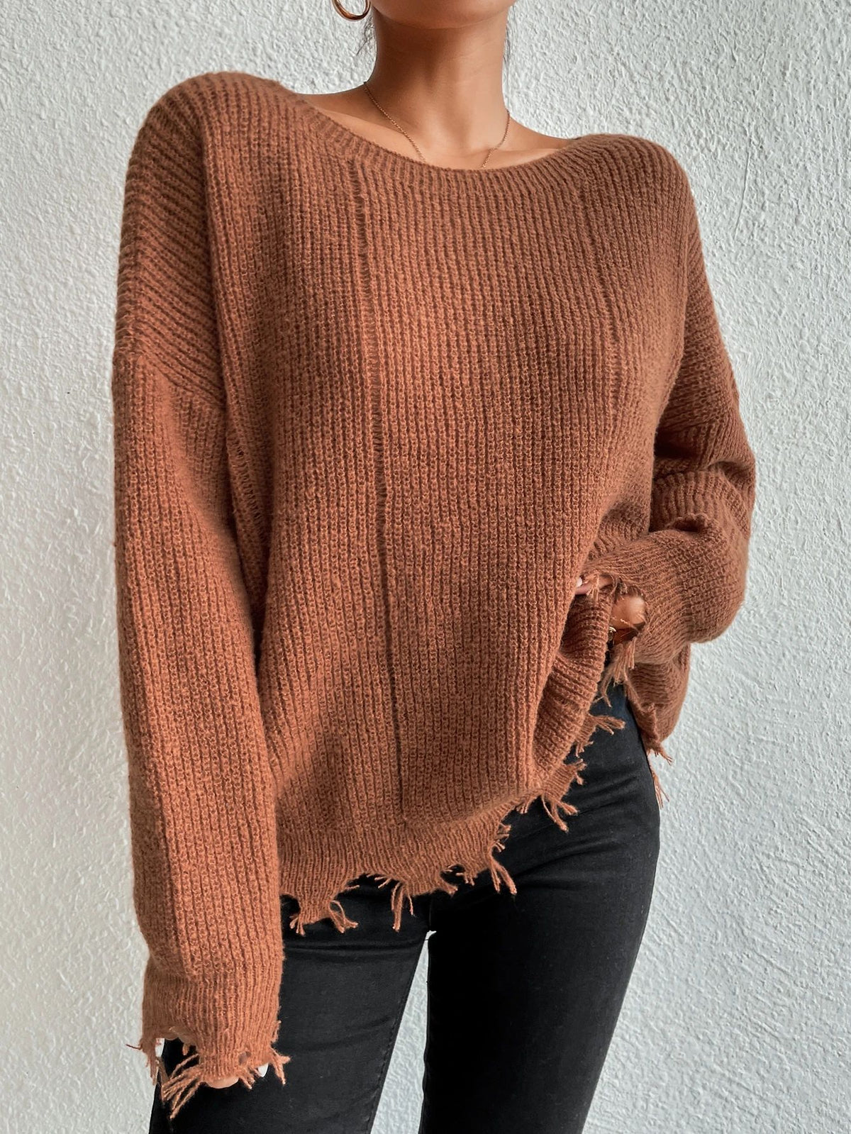 Solid color round neck ripped design loose knit sweater