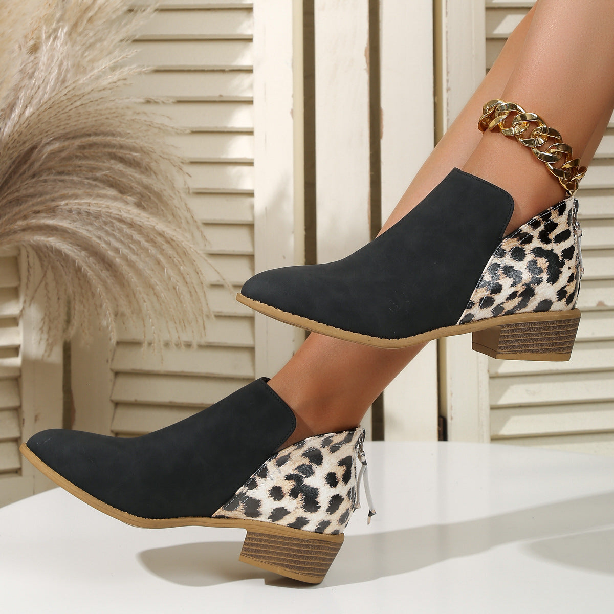 Suede leopard print paneled back zip booties