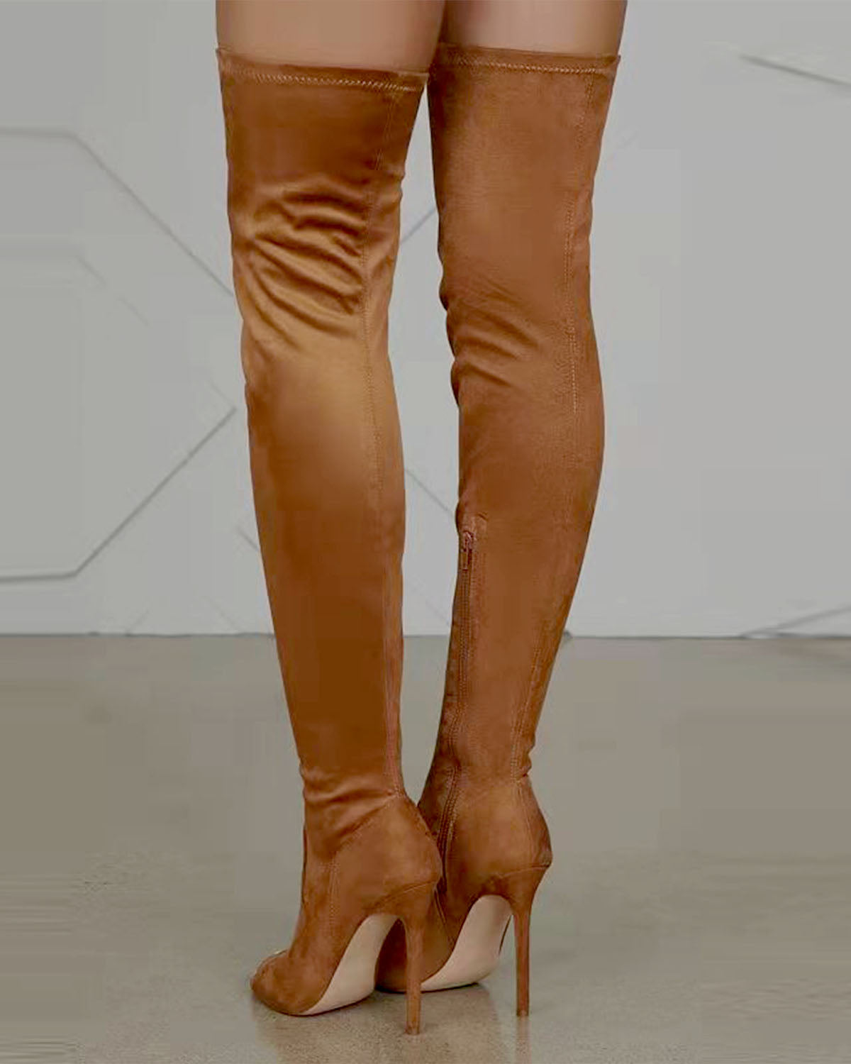 Bottes extensibles à talons hauts et fermeture éclair latérale au-dessus du genou