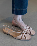 Baggy-Sandalen mit niedrigem Absatz im Retro-Stil aus durchbrochenem Schaffell