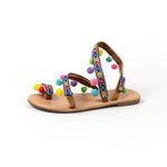 Sandales plates bohème à pompons et brides croisées