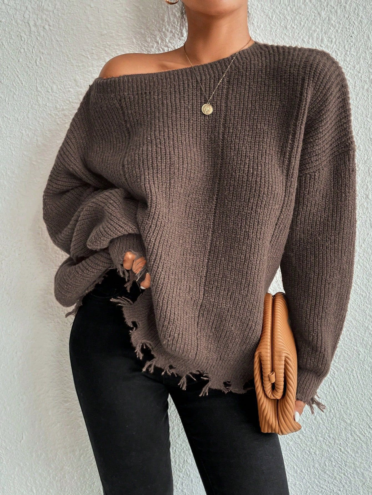 Solid color round neck ripped design loose knit sweater