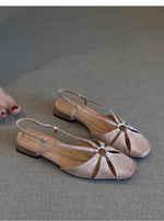 Baggy-Sandalen mit niedrigem Absatz im Retro-Stil aus durchbrochenem Schaffell