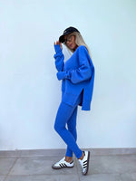 Loose long-sleeved round neck slit top and tight pants two-piece set