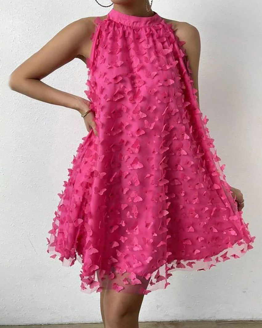 Mini-robe dos nu en maille avec appliques florales