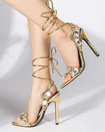 Luxurious rhinestone-encrusted wraparound strappy stiletto sandals