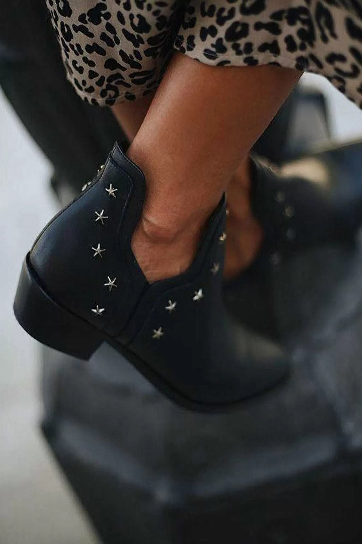 Metal five-star embellished low-heeled ankle boots