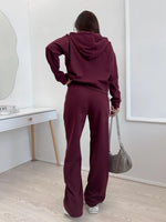Zippered hooded sweatshirt and lace-up trousers two-piece set