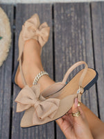 Large bow pointed toe flat heel sandals