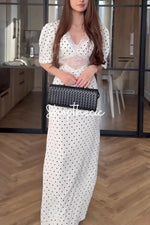 Abito lungo a pois con scollo a V in pizzo retrò e maniche corte