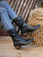 Bottines noires mi-mollet plissées à talon épais