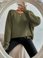 Solid color round neck ripped design loose knit sweater