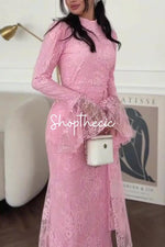 Abito in pizzo con geometria morbida