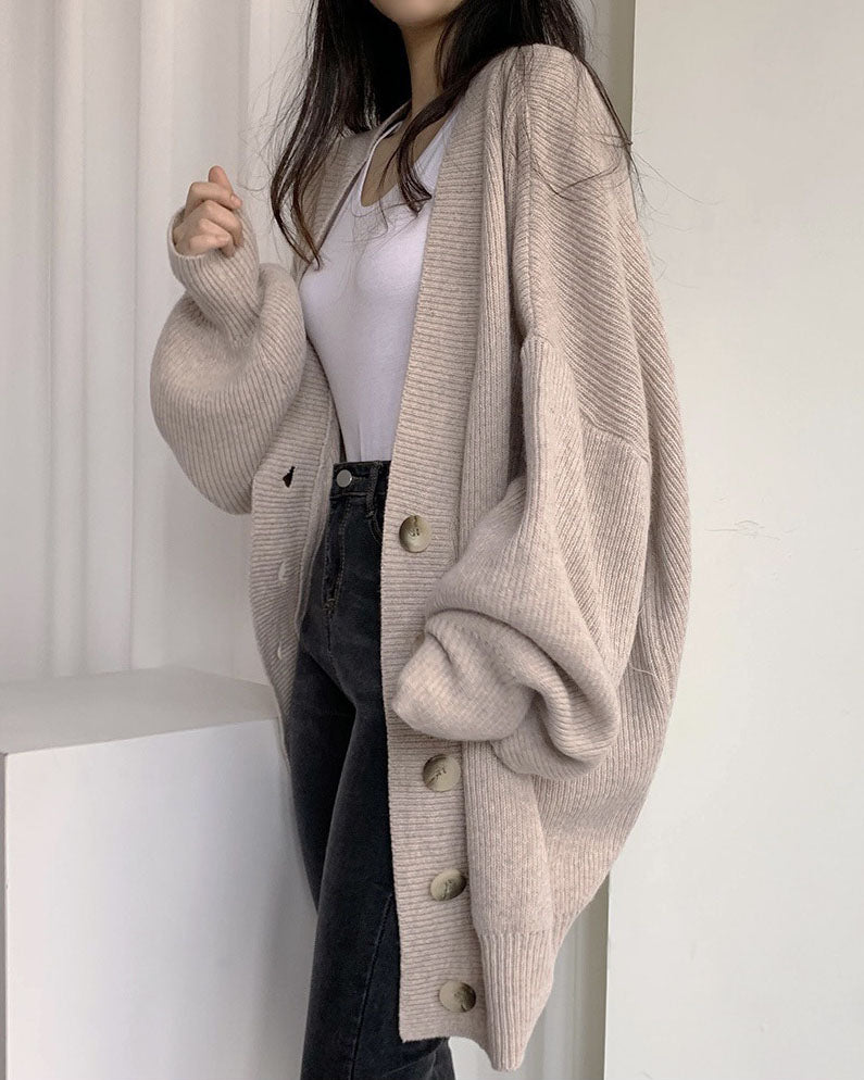 Cardigan tricoté à manches lanternes amples à simple boutonnage et col en V