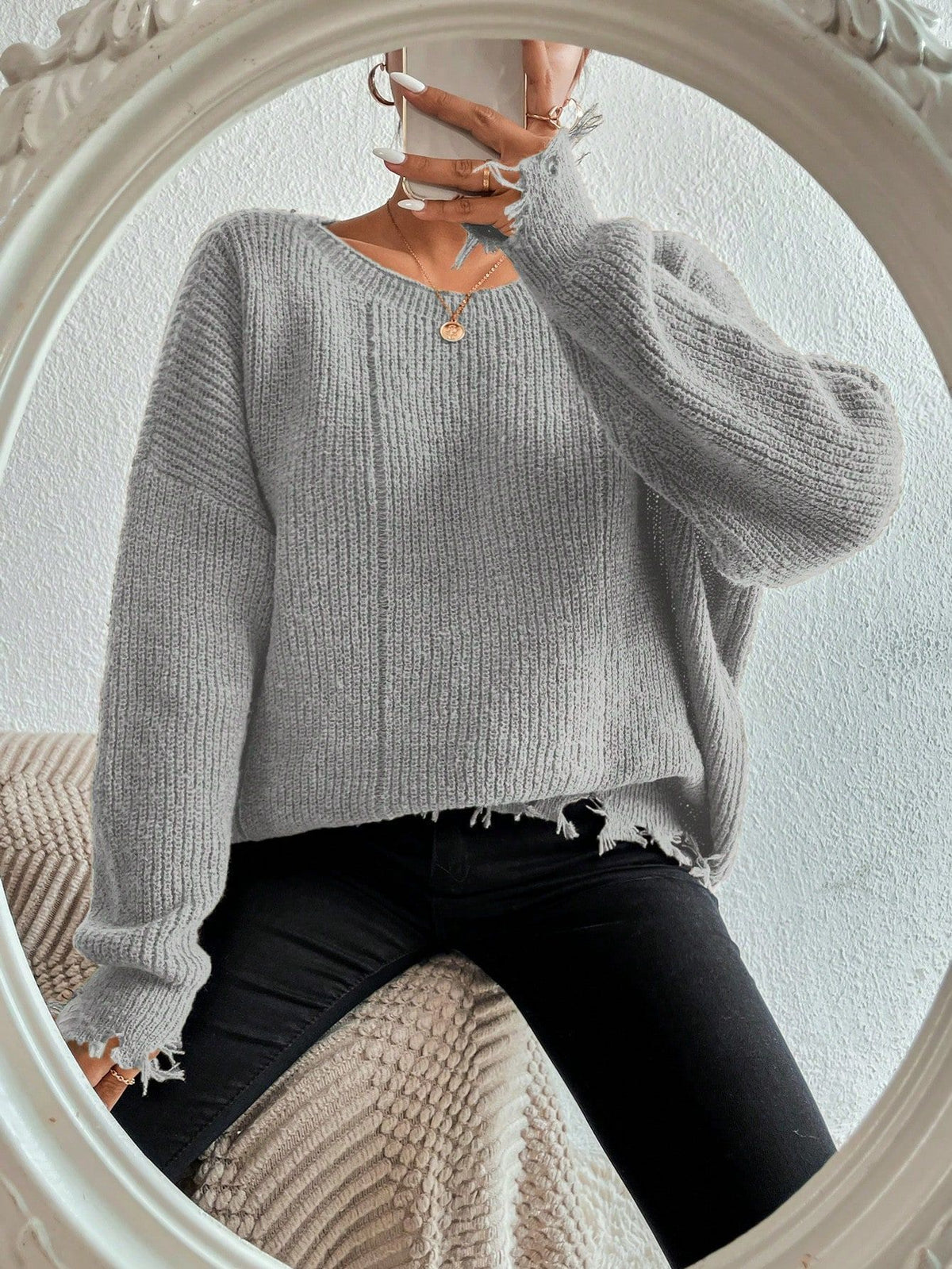 Solid color round neck ripped design loose knit sweater