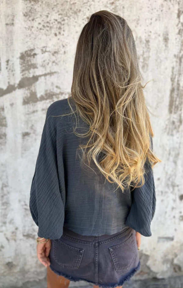 Low-cut V-neck button-down cotton and linen shirt