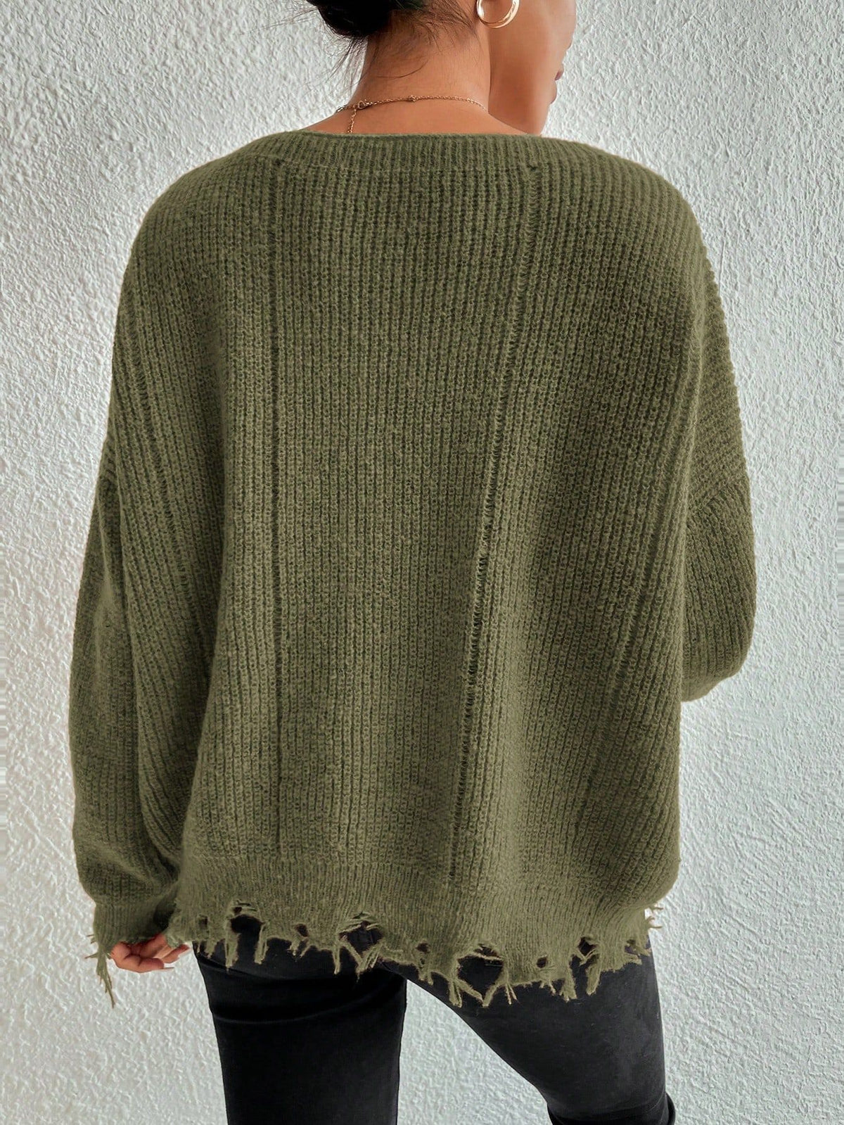 Solid color round neck ripped design loose knit sweater