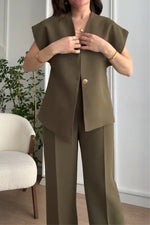 Irregular V-neck top and high-waisted trousers two-piece suit