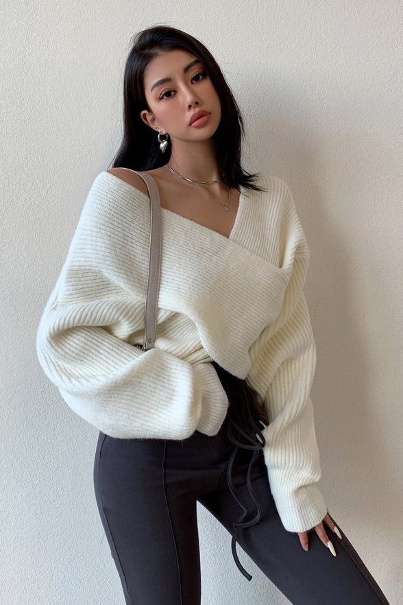 Off-the-shoulder cross-over asymmetrical cropped sweater