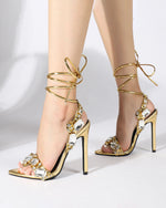 Luxurious rhinestone-encrusted wraparound strappy stiletto sandals