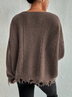 Solid color round neck ripped design loose knit sweater