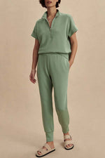 Stand-up collar half-zip short-sleeve top and tapered sweatpants two-piece set