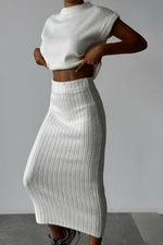 Sleeveless knitted pullover top and fitted long skirt two-piece set