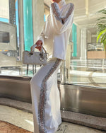 Zweiteiliges Set mit Rollkragen und langen Ärmeln und Pailletten