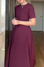 Temperament solid color waist loose hem midi dress