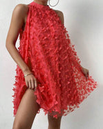 Mini-robe dos nu en maille avec appliques florales