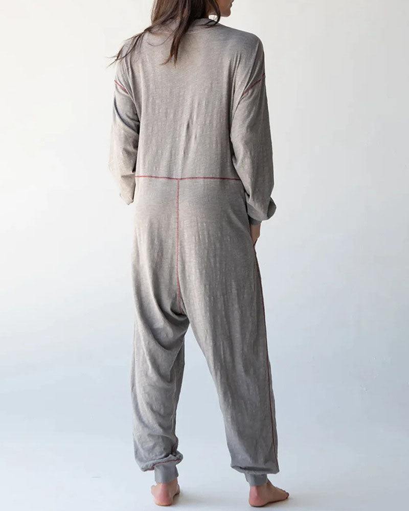 Jumpsuit mit V-Ausschnitt, breitem Revers und tiefem Schritt