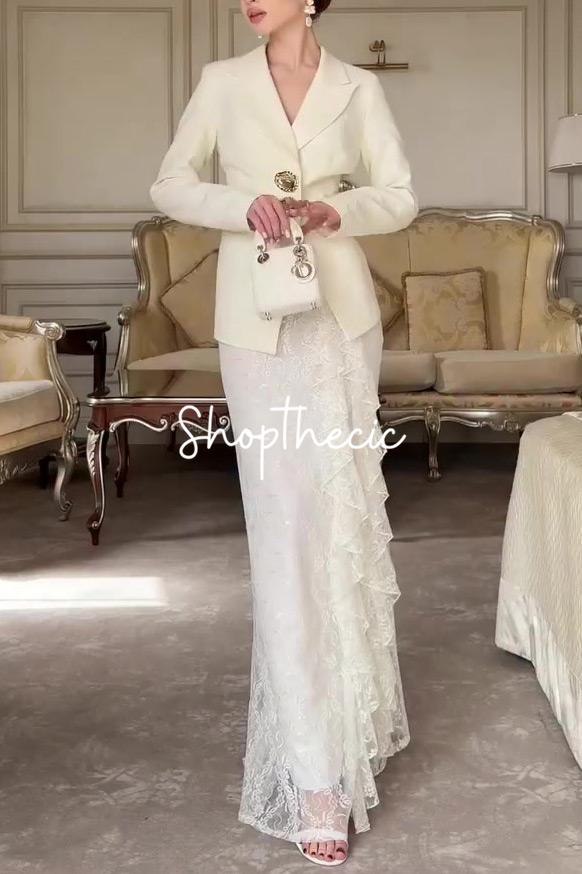 Completo due pezzi con giacca e gonna in pizzo, eco dell'Art Déco