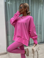 Loose long-sleeved round neck slit top and tight pants two-piece set