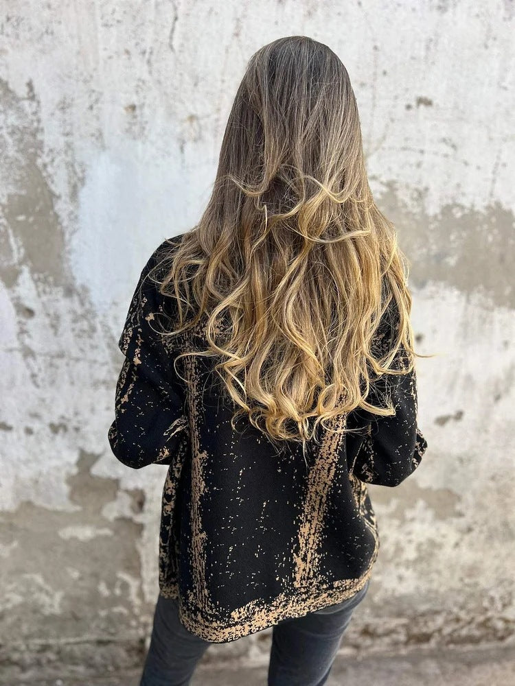 Bunt bedruckte Reversjacke aus Strick mit Metallknöpfen