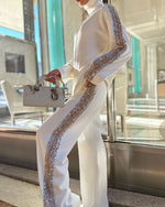 Zweiteiliges Set mit Rollkragen und langen Ärmeln und Pailletten