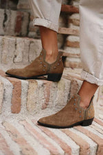 Metal five-star embellished low-heeled ankle boots