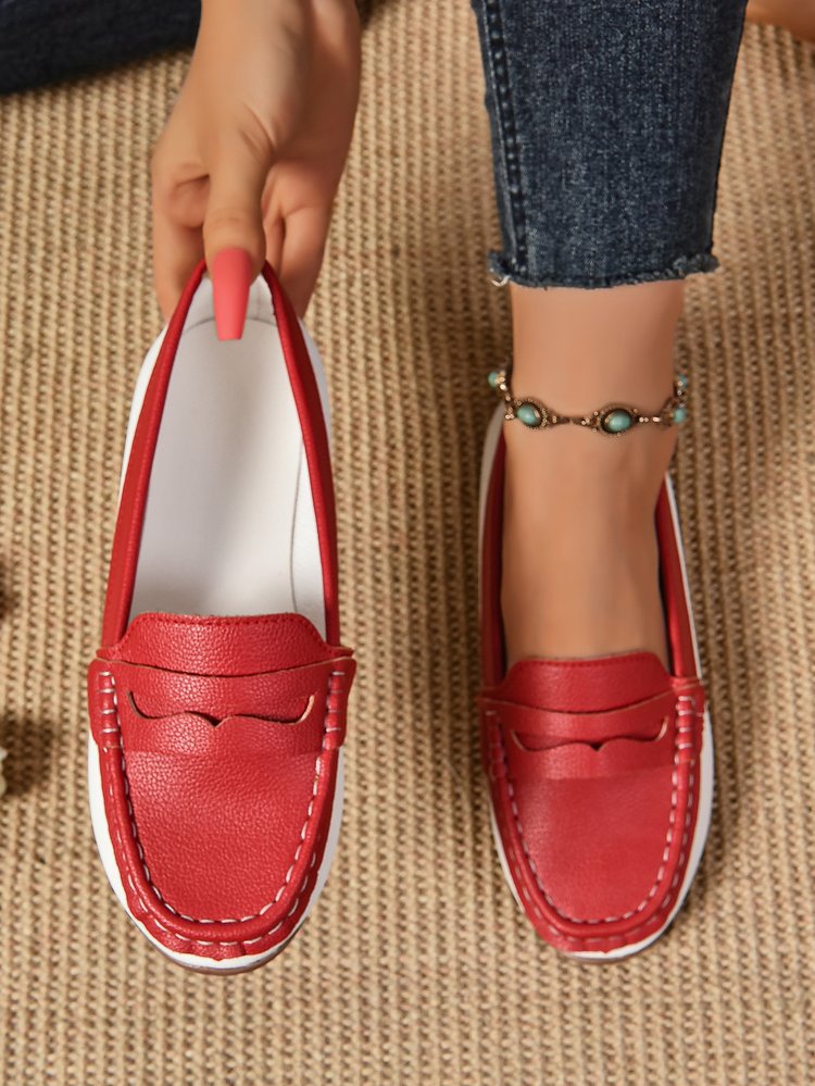 Red and white stitching rubber sole loafers