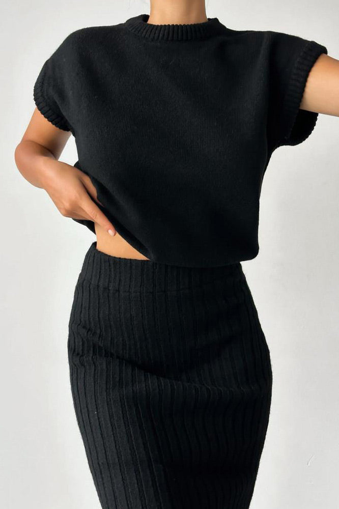 Sleeveless knitted pullover top and fitted long skirt two-piece set