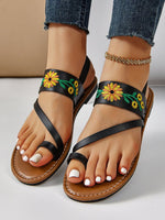 Sandales plates brodées à bride arrière