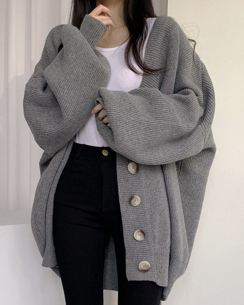 Cardigan tricoté à manches lanternes amples à simple boutonnage et col en V