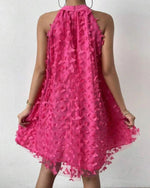 Mini-robe dos nu en maille avec appliques florales