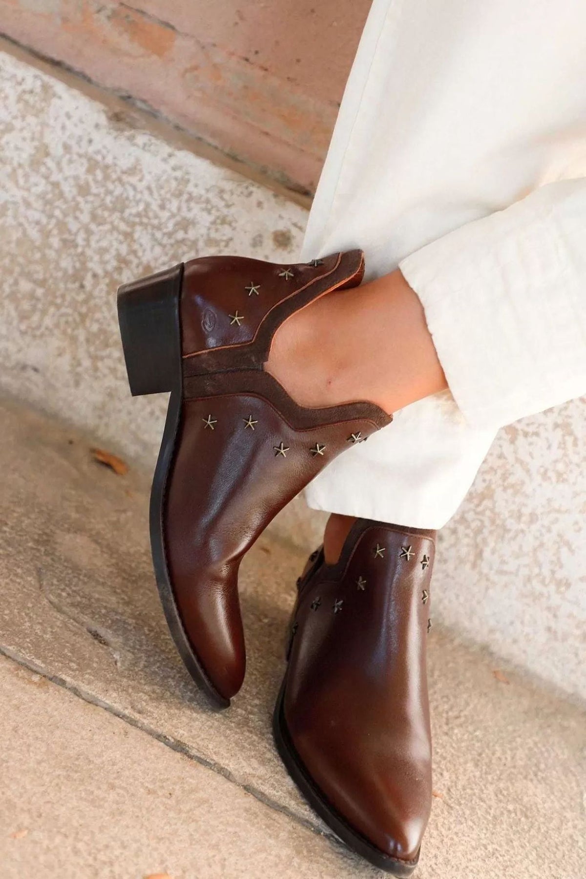 Metal five-star embellished low-heeled ankle boots