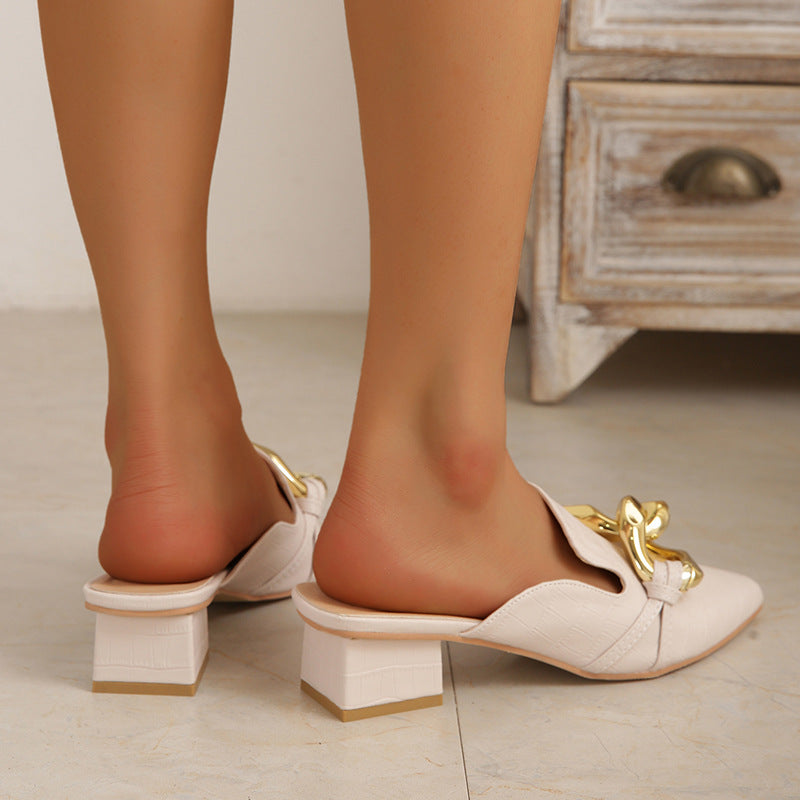 Pointed toe metal buckle flat mules