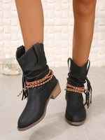 Bottes mi-mollet à pampilles et lanières tressées